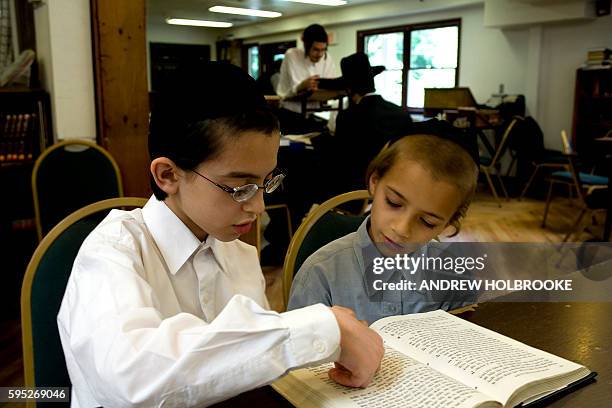 Orthodox Jewish boys study the Torah at the Yeshiva Kol Yaakov in Monsey, New York.