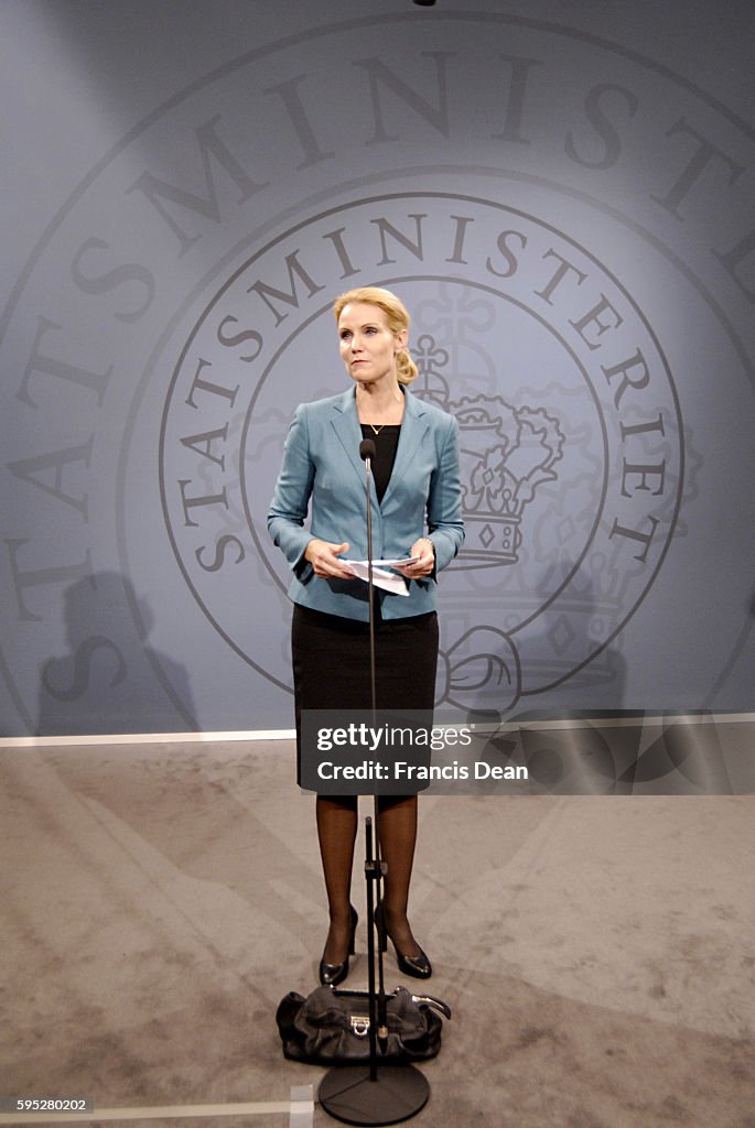 Former minister Lars Lokke Rasmussen welcomes new female minister helle Thoning-schmidt today