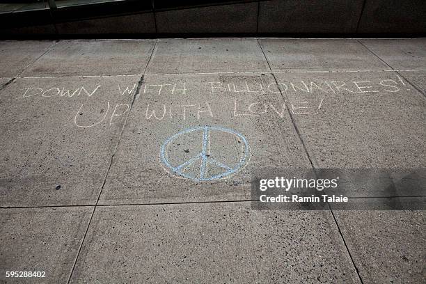 Demonstrators write anti-corporation messages on streets near Wall Street in Lower Manhattan on Saturday, September 17, 2011. Organizers calling for...