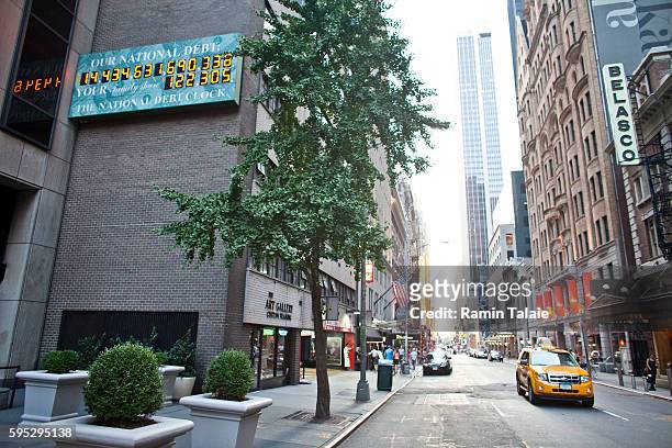 The National Debt Clock billboard is displayed on a building in midtown Manhattan on August 2, 2011 in the New York City. The national debt exceeds...