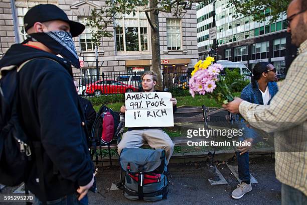 Demonstrators gather at Bowling Green Park in Lower Manhattan on Saturday, September 17, 2011. Organizers calling for 20,000 people to occupy Wall...