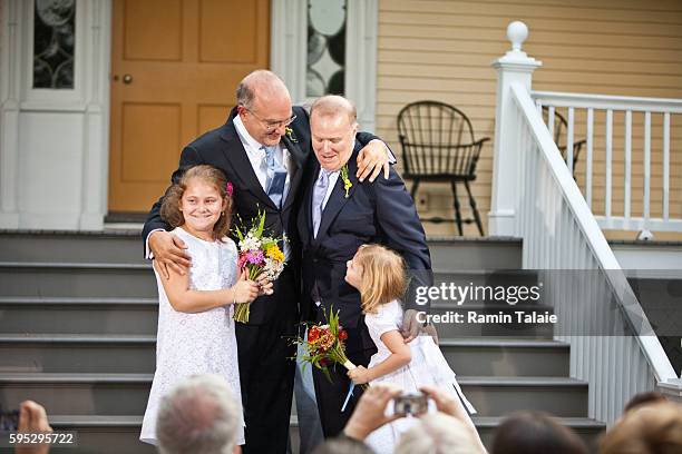 Jonathan Mintz , New York City's consumer affairs commissioner, and John Feinblatt , a chief adviser to the mayor, celebrate their marriage with...