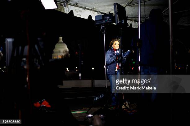 Newscaster from NBC affiliate channel 10 broadcasts in front of the Capitol Building the day of President Barack Obama's 57th Inauguration in...