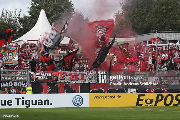 Fans of Bayer Leverkusenn during the DFB Cup match between SC Hauenstein and Bayer 04 Leverkusen at Stadium Husterhoehe on August 19, 2016 in...