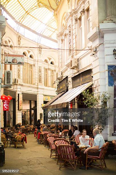 people outside cafe, bucharest, romania - bucharest stock pictures, royalty-free photos & images