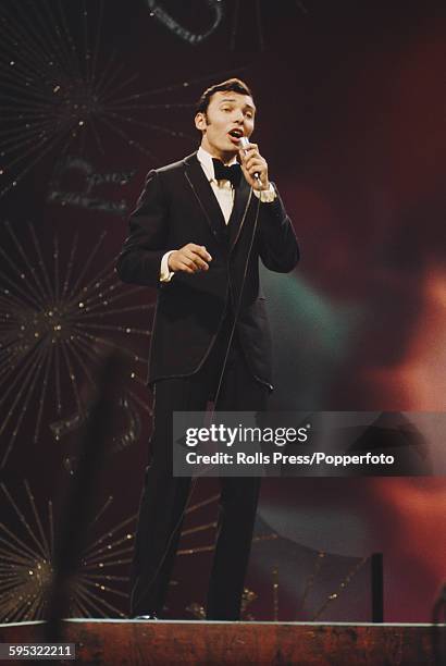 Czech singer Karel Gott performs the song 'Tausend Fenster' on stage for Austria in the Eurovision Song Contest at the Royal Albert Hall in London on...