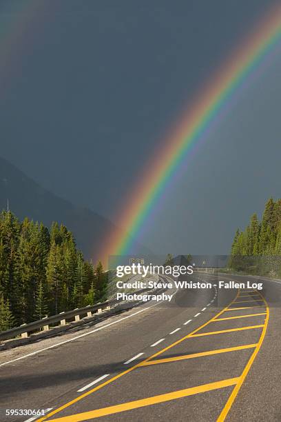 rainbow over mountain highway - log driver canada stock pictures, royalty-free photos & images