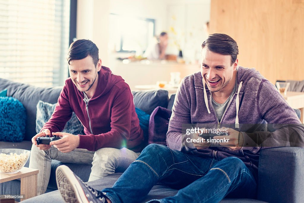 Friends playing video game