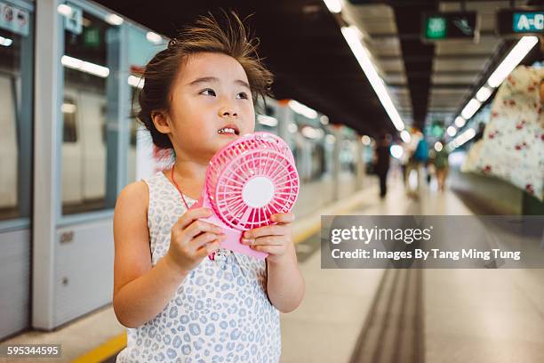 Children Using Number Fans 270 Fan Blowing Child Stock Photos, High-Res Pictures, and Images ...