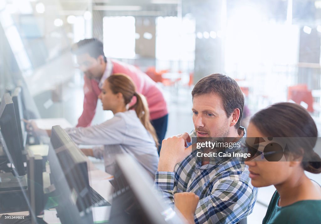 Students at computers in adult education classroom