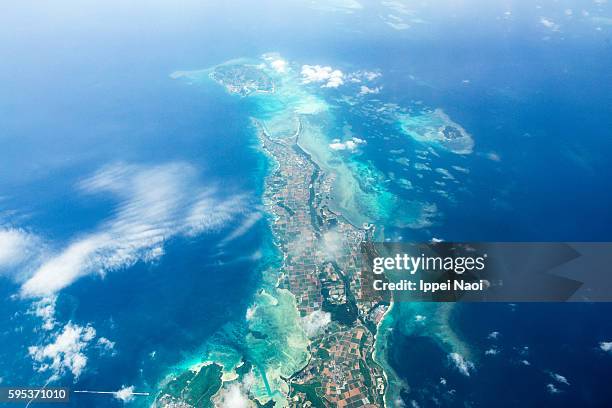 aerial view of tropical island with coral reefs, miyako-jima, okinawa, japan - okinawa aerial stock pictures, royalty-free photos & images