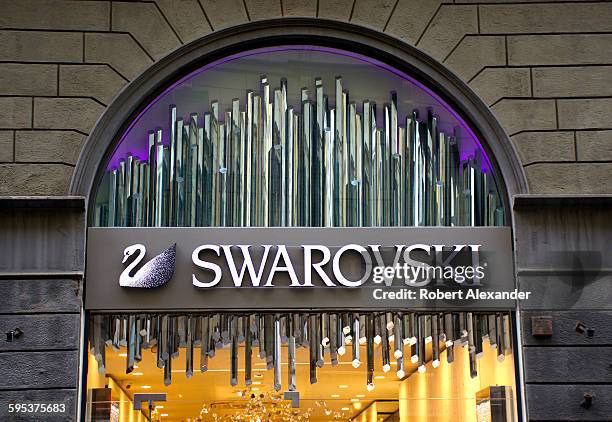 Exterior view of a Swarovski jewelry and fashion accessories store in Florence, Italy. Founded in 1895 in Austria, Swarovski designs and markets...