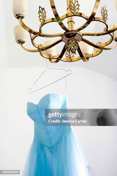 blue vintage bridesmaid dress - blue dress hanger stock pictures, royalty-free photos & images