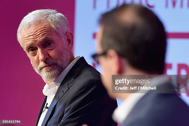 Jeremy Corbyn and Owen Smith attend a Labour Party leadership debate on August 25, 2016 in Glasgow, Scotland. Jeremy Corbyn and Owen Smith are going...