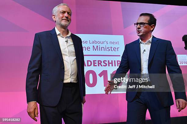 Jeremy Corbyn and Owen Smith shake hands following a Labour Party leadership debate on August 25, 2016 in Glasgow, Scotland. Jeremy Corbyn and Owen...