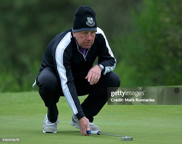 Professional Richard Green lines up a putt on the 14th green during the PGA Super 60s Tournament at Gleneagles on August 25, 2016 in Auchterarder,...