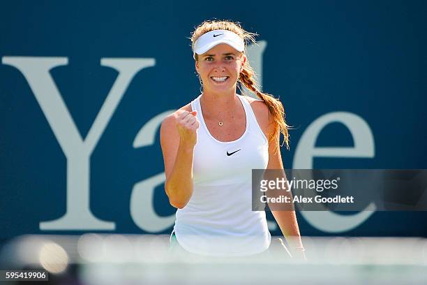 Elina Svitolina of Ukraine celebrates after defeating Elena Vesnina of Ukraine on day 5 of the Connecticut Open at the Connecticut Tennis Center at...