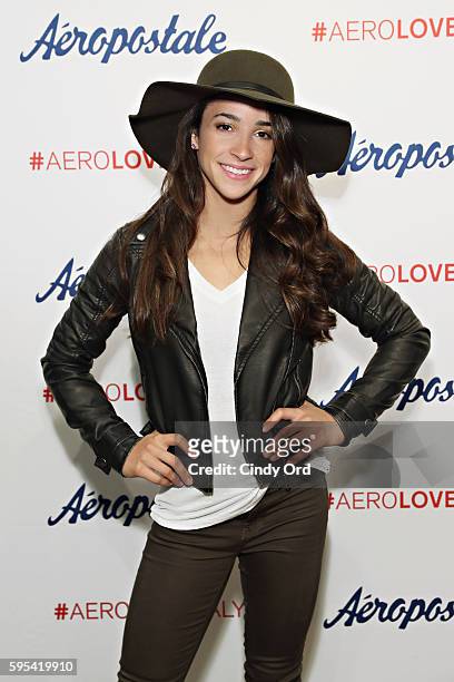 Olympic medalist Aly Raisman takes part in a fan meet and greet during a promotion for Aeropostale's Seriously Stretchy Denim at Aeropostale on...