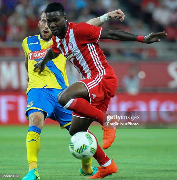 Olympiaco's Greek forward Brown Ideye vies with Arouca's defender Sema Velazquez during UEFA Europa League match between FC Olympiacos and FC Arouca...