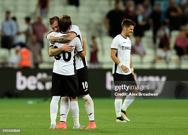 Florin Lovin and Denis Alibec of FC Astra Giurgiu celebrate following the UEFA Europa League match between West Ham United and FC Astra Giurgiu at...