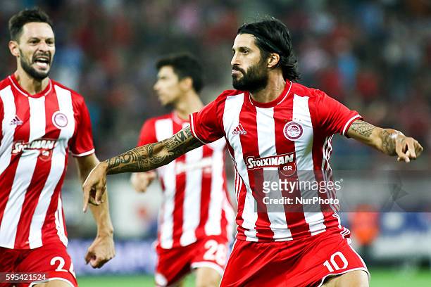 Olympiaco's Argentinian midfielder Chori Domiguez celebrates after scoring a goal during UEFA Europa League match between FC Olympiacos and FC Arouca...