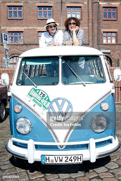 Austrian actor Fritz Karl and german actress Elena Uhlig attend the first day of the Hamburg-Berlin Klassik Rallye on August 25, 2016 in Hamburg,...