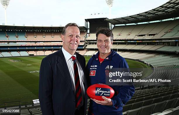 Paul Roos, Senior Coach of the Demons and Melbourne Demons President Glen Bartlett during a Melbourne Demons AFL press conference at the Melbourne...