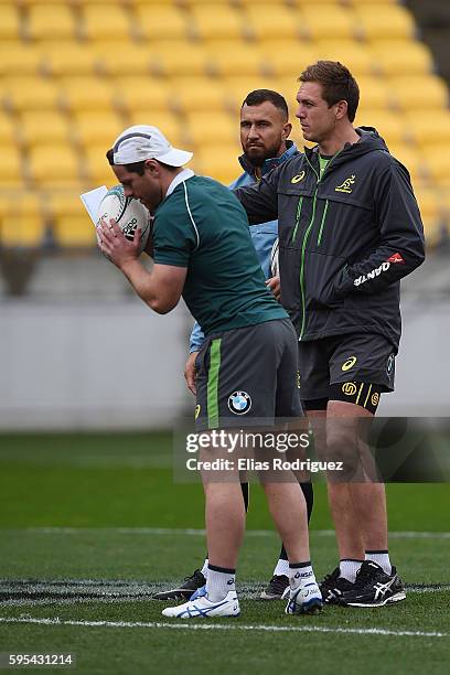 Bernard Foley and Quade Cooper during the Australia Wallabies Captain's Run at Westpac Stadium on August 26, 2016 in Wellington, New Zealand.