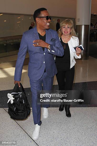 Charlie Wilson and Mahin Wilson are seen at LAX on August 25, 2016 in Los Angeles, California.