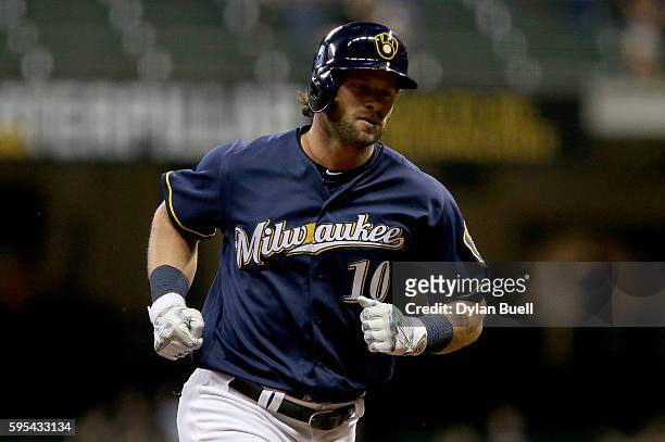Kirk Nieuwenhuis of the Milwaukee Brewers rounds the bases after hitting a home run in the seventh inning against the Pittsburgh Pirates at Miller...