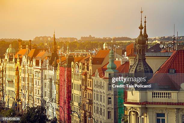 old colourful buildings at sunset in center prague, czech republic, europe - tancici dum stock pictures, royalty-free photos & images