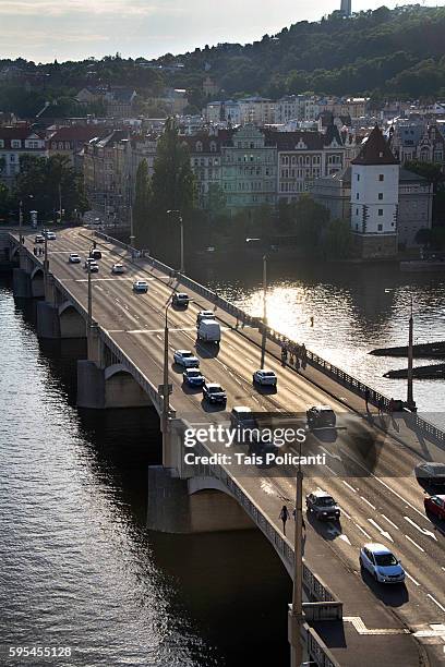 jirásek bridge(jiráskův most) with daily traffic over the vltava prague, czech republic, europe - the moldau river stock pictures, royalty-free photos & images
