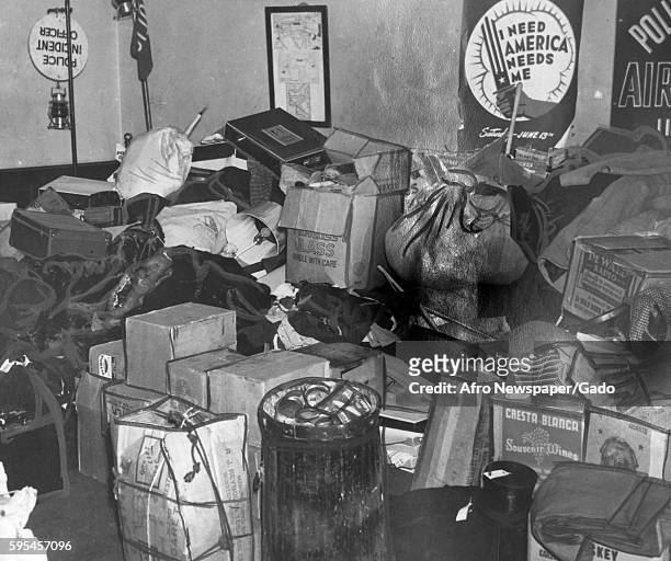 Valuable items from stores looted during a riot are stored in a police station in Baltimore, Maryland, August 7, 1943.