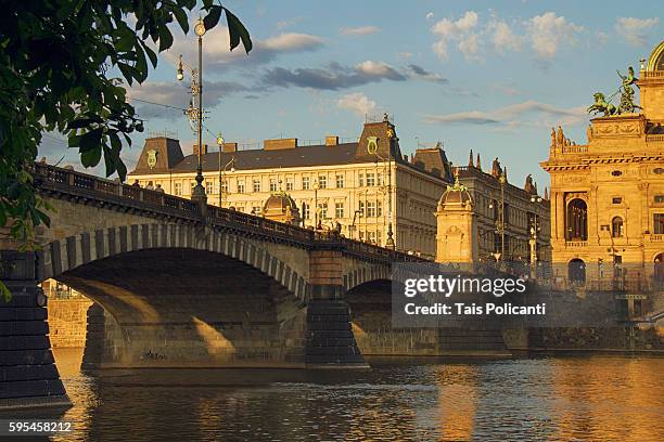 the national theatre (národní divadlo) and the bridge of the legions (most legii) at sunset in prague, czech republic, europe - the moldau river stock pictures, royalty-free photos & images