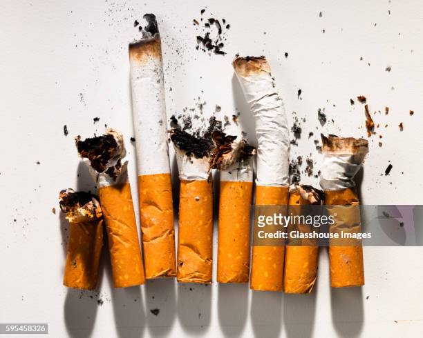 smoked cigarettes in row - e cig foto e immagini stock
