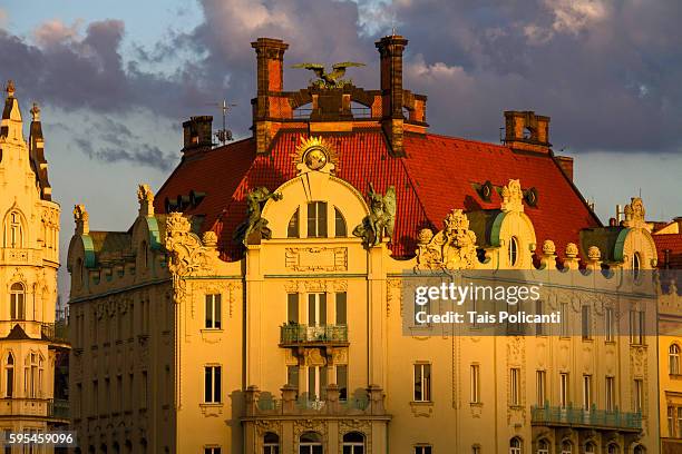 beautiful old building in center prague at sunset, czech republic, europe - tancici dum stock pictures, royalty-free photos & images