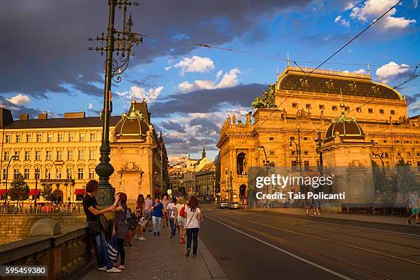street life and the national theatre (národní divadlo) at sunset in prague, czech republic, europe - the moldau river stock pictures, royalty-free photos & images