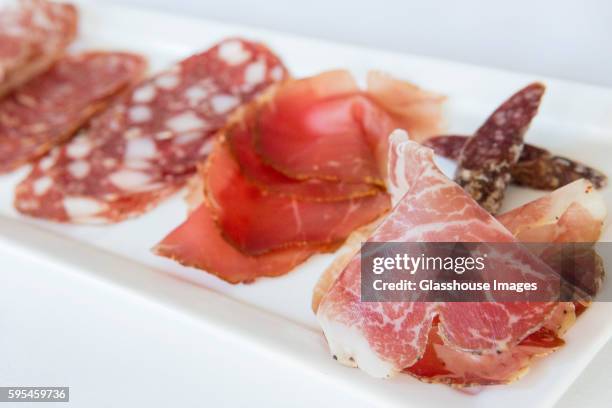 charcuterie on small platter, close up - デリカッセン ストックフォトと画像