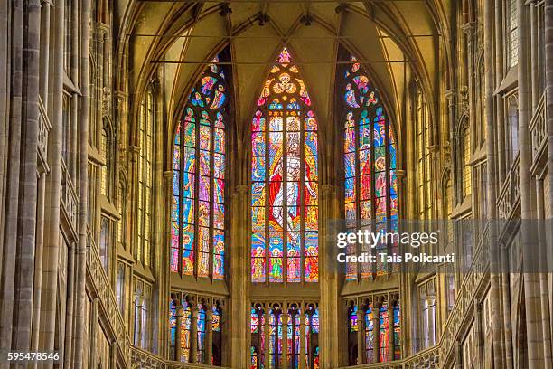 stained glass art inside the st. vitus cathedral(velká jižní věž katedrály sv. víta) in prague, czech republic, europe - tancici dum stock pictures, royalty-free photos & images