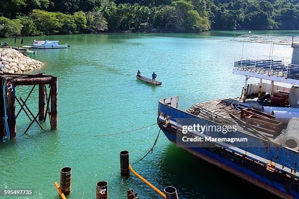 the ferry from playa naranjo and puntarenas - puntarenas stock pictures, royalty-free photos & images