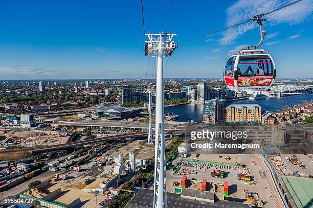 emirates air line and the royal docks - overhead cable car stock pictures, royalty-free photos & images
