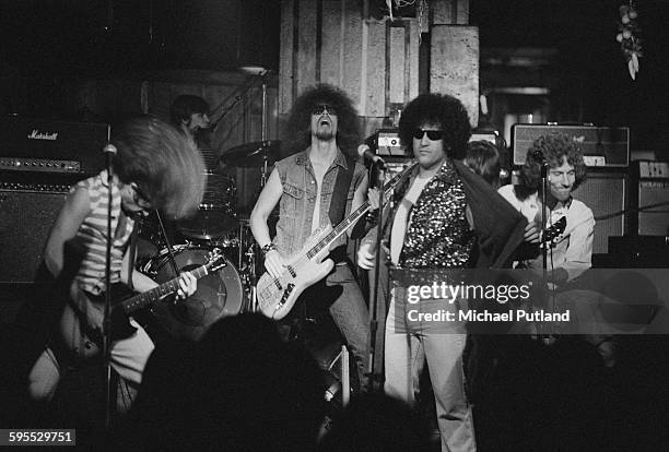 American punk rock band The Dictators perform on stage, USA, 30th July 1976. Singer Richard 'Handsome Dick' Manitoba is at centre, right in...