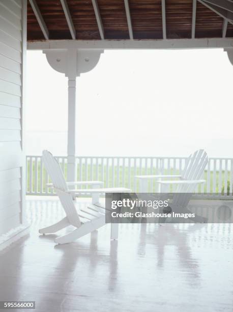 two adirondack chairs on porch, hamptons, long island, new york, usa - the hamptons imagens e fotografias de stock