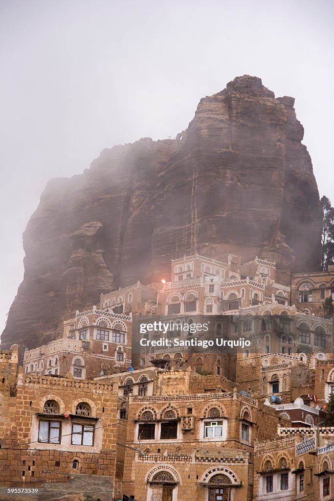 Village of Al Tawilah underneath a rocky hill
