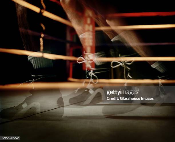 boxer shuffling feet in boxing ring, stop motion - fighting ring stock pictures, royalty-free photos & images