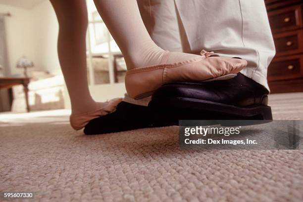daughter dancing on father's feet - ballroom dancing feet stock pictures, royalty-free photos & images