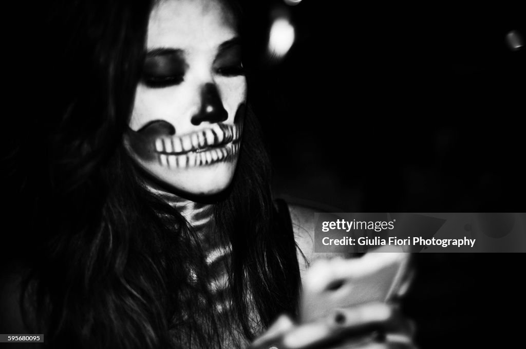 Woman with skull make-up for Halloween