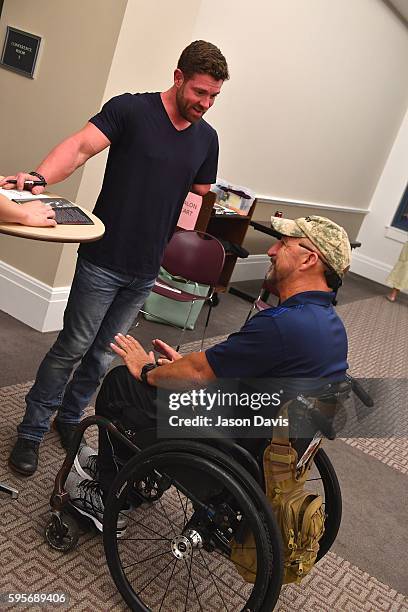 Author and Motivational Speaker Noah Galloway signs books at Nashville Public Library on August 25, 2016 in Nashville, Tennessee.