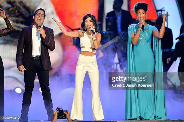 Raul Gonzalez, Carolina Gaitan and Jeimy Osorio onstage at Telemundo's Premios Tu Mundo "Your World" Awards>> at American Airlines Arena on August...