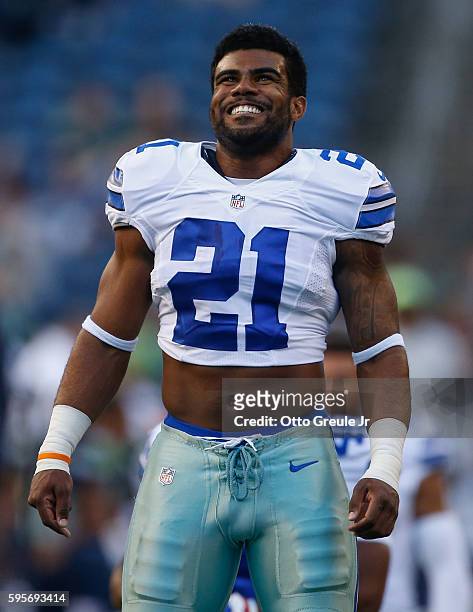 Running back Ezekiel Elliott of the Dallas Cowboys warms up prior to the game against the Seattle Seahawks at CenturyLink Field on August 25, 2016 in...
